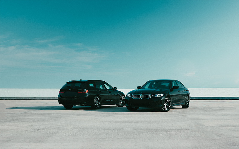 black bmw cars on a rooftop
