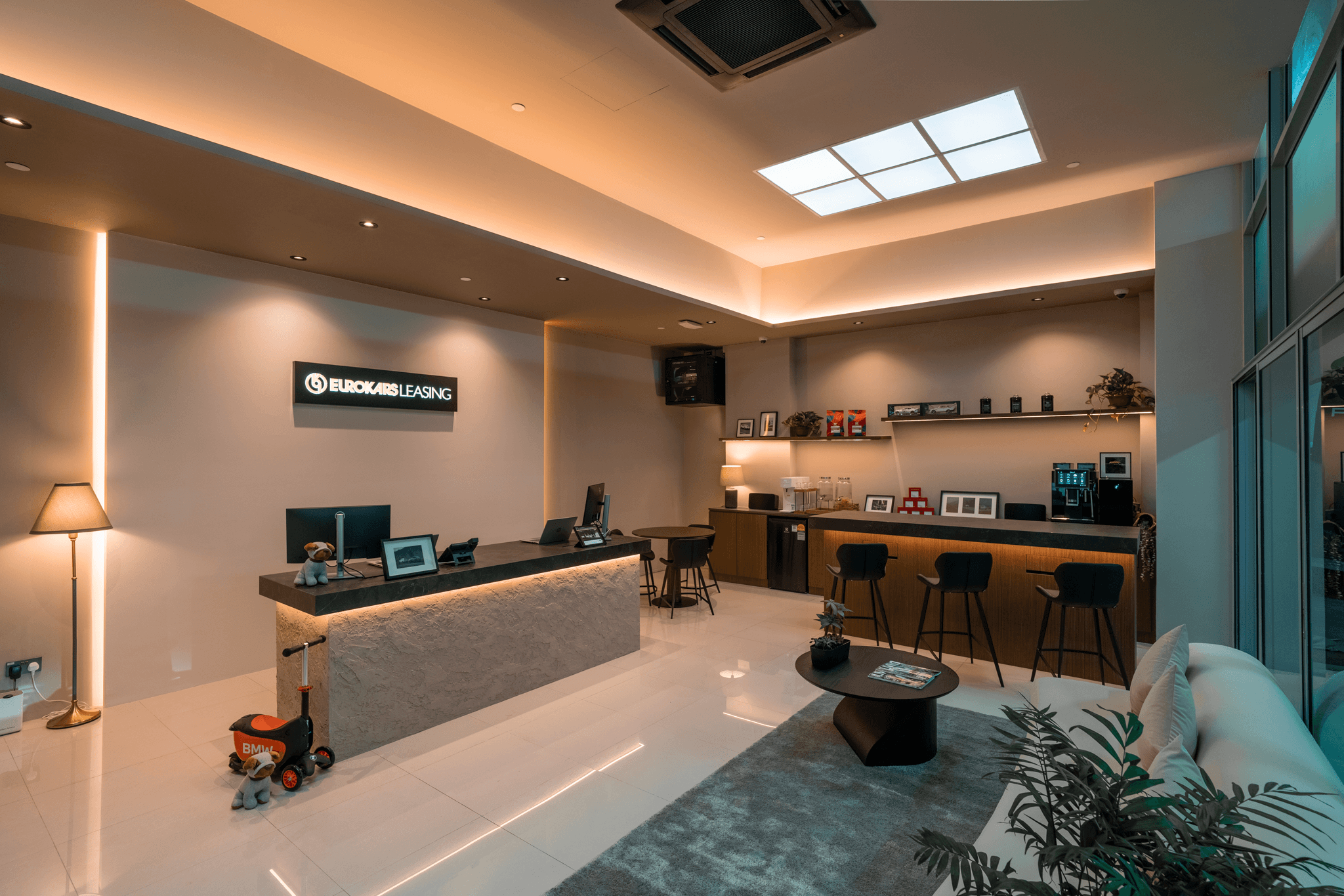 Interior of Eurokars Leasing City Lounge at The Alexcier, Singapore, where customers collect rental cars and access leasing services.